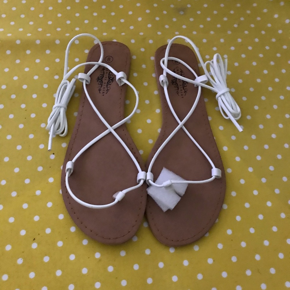 White gladiator style sandals. NWT. Size 8 with box